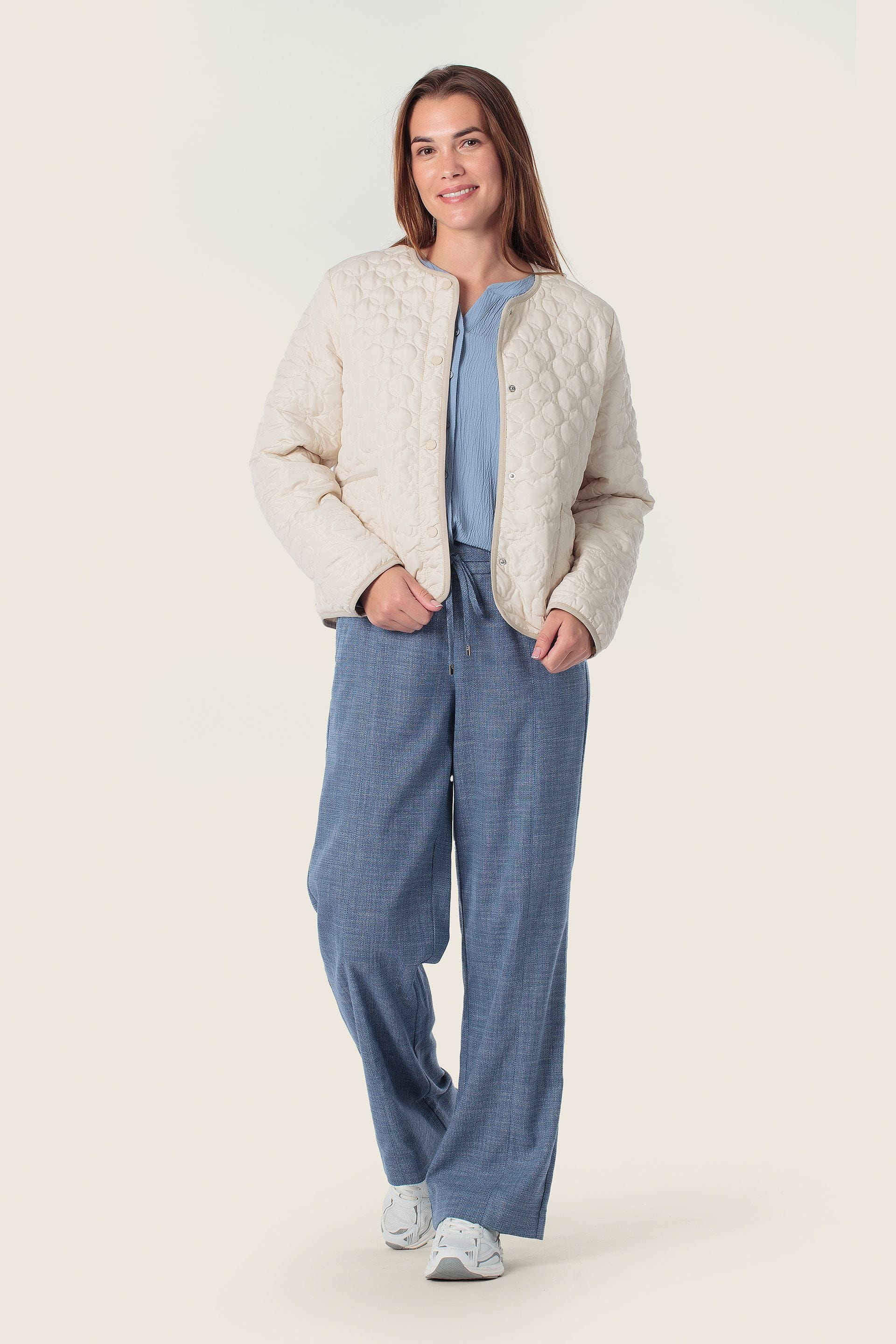 Beige Steppjacke mit Rundquiltmuster